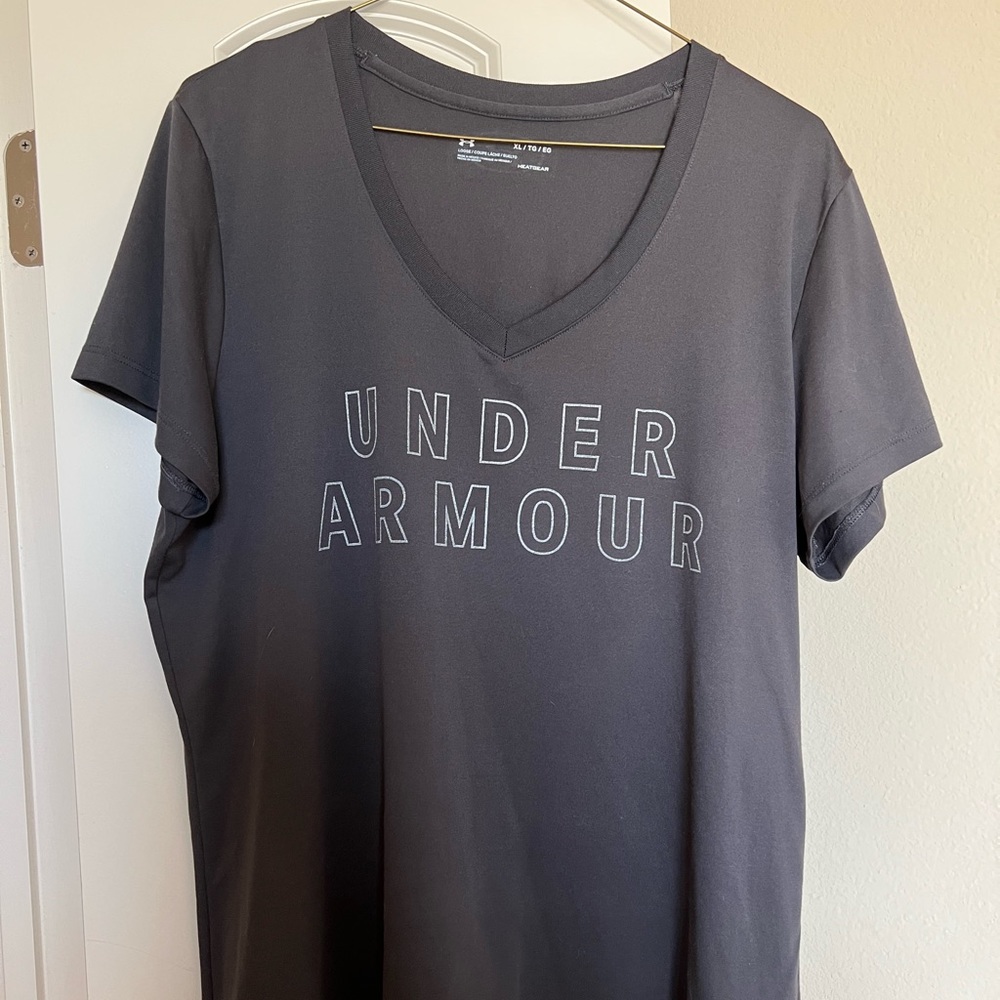 Under armor headgear woman’s V-neck  shirt